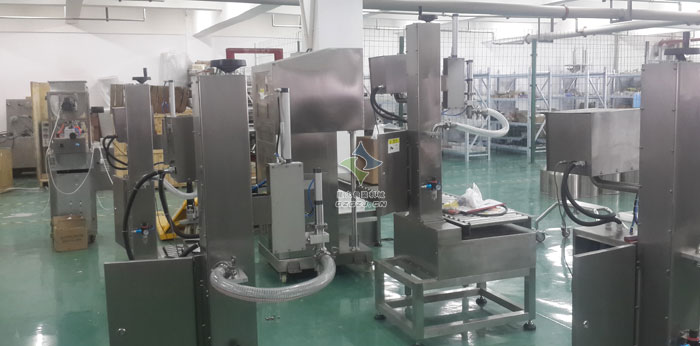 芝麻醬稱重灌裝封口機(jī),盒裝袋稱重灌裝封口機(jī)